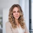 Lisa Frerk, Disponentin bei AMGEON